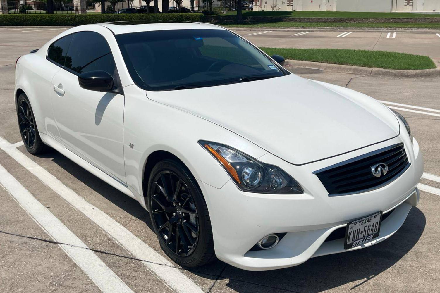 Squeezing into the Backseat of an Infiniti G37 Coupe