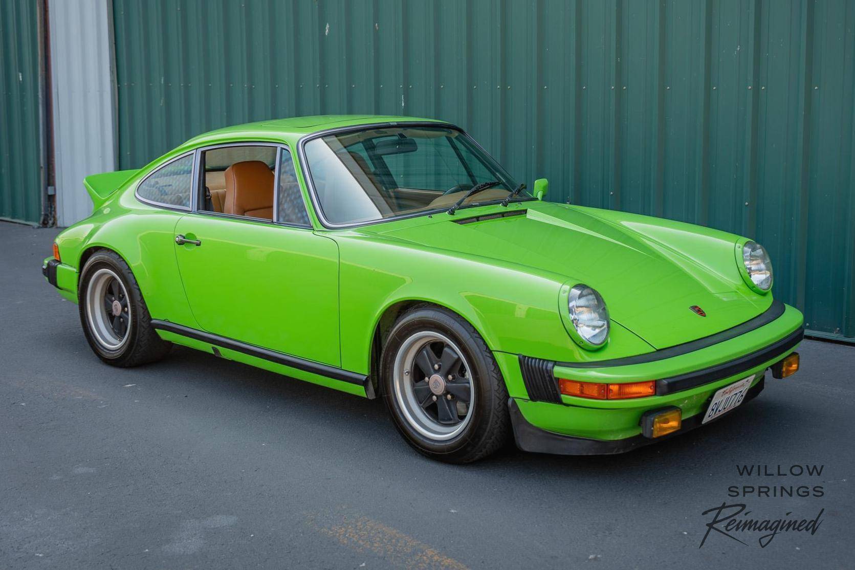 Lime Green 1975 Porsche 911 Carrera With Mostly Original Paint and a Spare Whale Tail Is Bidding at $51,911 on Cars & Bids