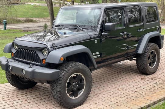 2013 Jeep Wrangler Unlimited Sport 4x4 auction - Cars & Bids